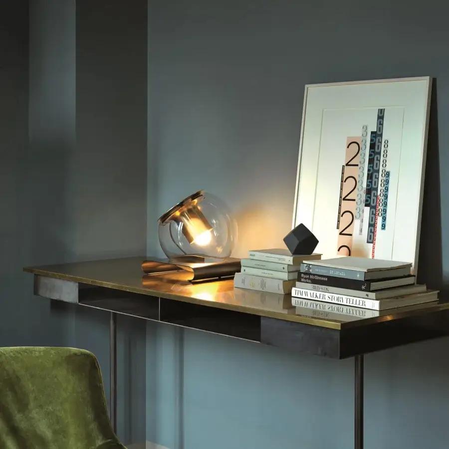 Exceptional Oluce Globe Table Lamp with transparent blown-glass sphere encased in brass-like metallic frame