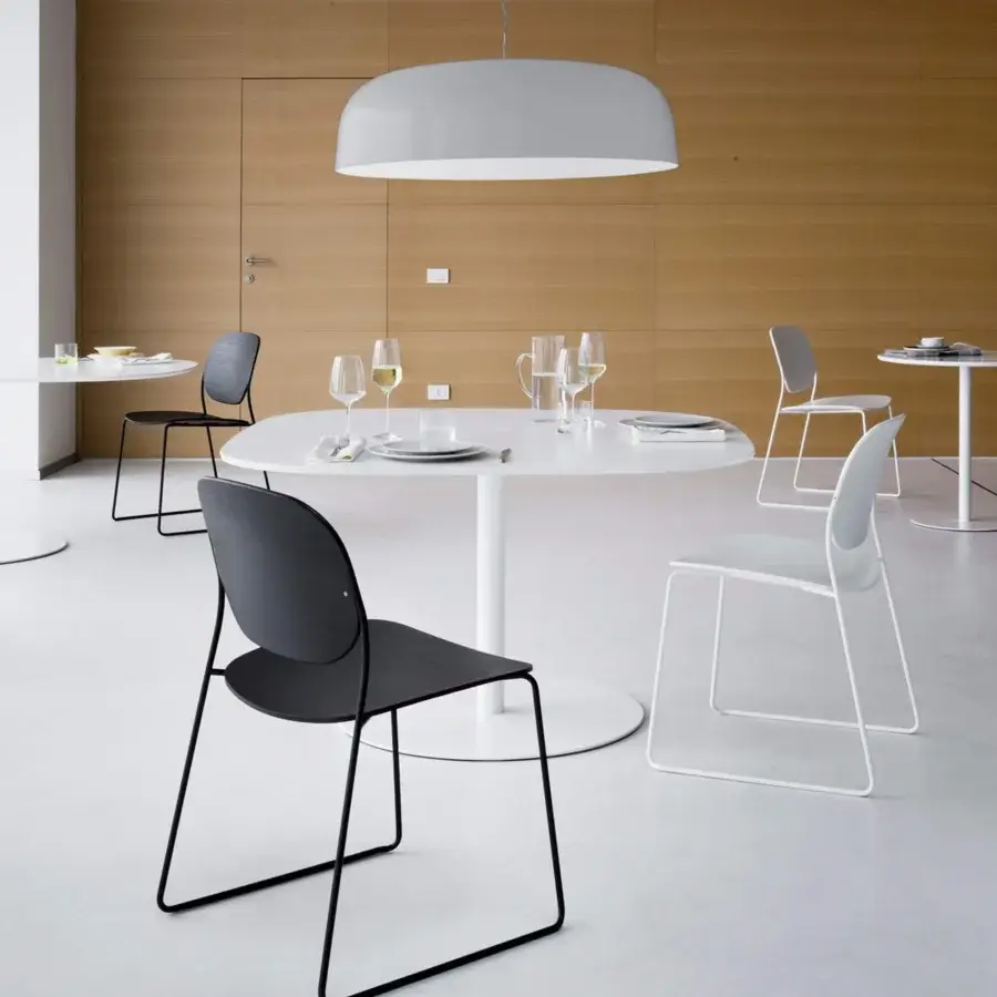 Distinguished Lapalma Rondò table with glossy white laminate tabletop and zinc-plated base clad in stainless steel with a linen fabric pattern