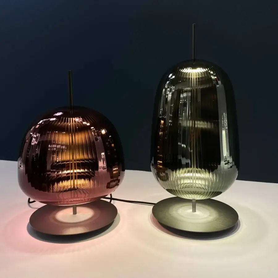 Captivating melogranoblu Bes table lamp with hand-blown glass, a pleated effect and satin metal base in olive-green hues