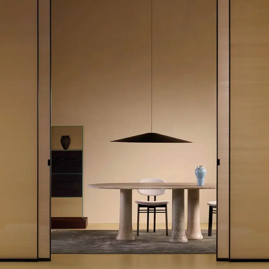 Distinguished Glas Italia Babar table crafted in recycled glass grit with a light beige surface and polished finish