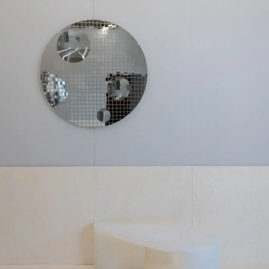 Exceptional Glas Italia Andromeda mirror crafted from reflective glass with a distinctive silver finish