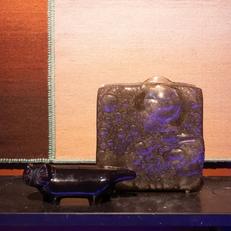 Superior Glas Italia Opalia vases crafted from fused glass with richly textured surfaces in deep purple and grey hues