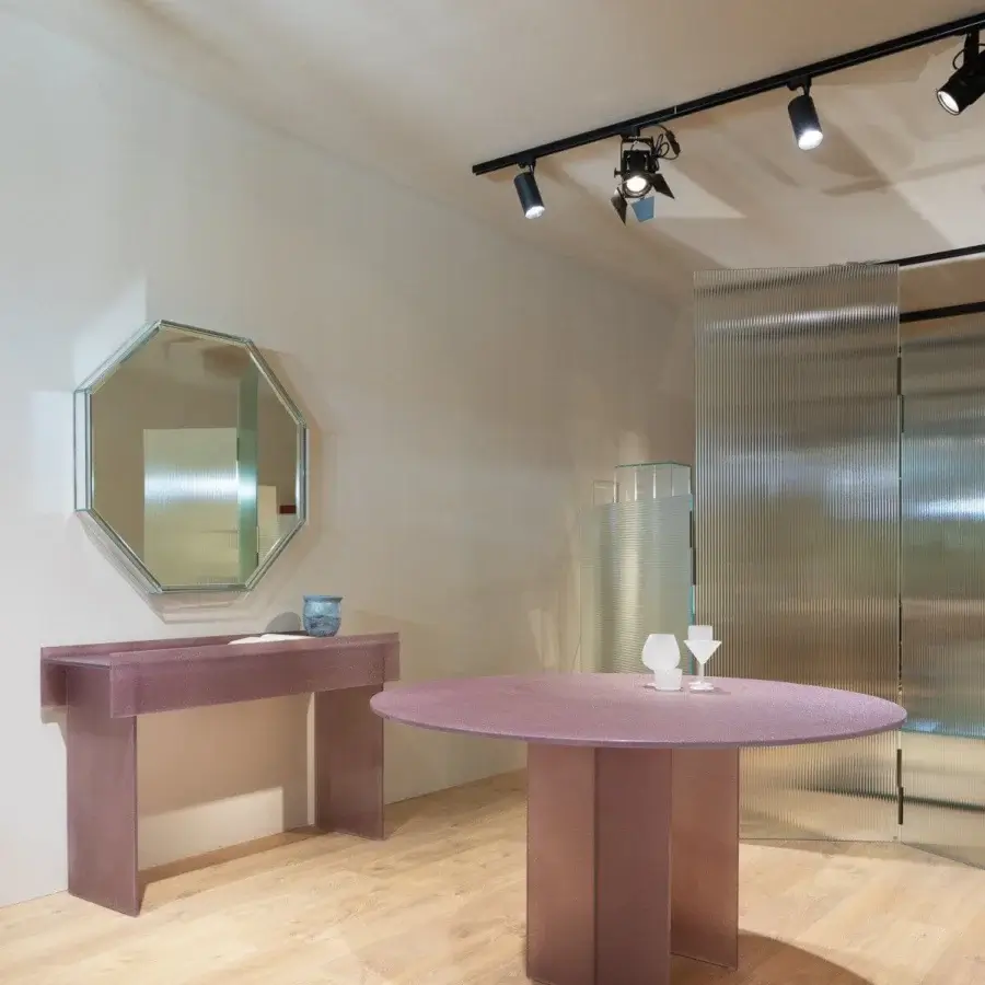 Distinguished Glas Italia Simoon table built with muted rose extralight glass and textured matte coating