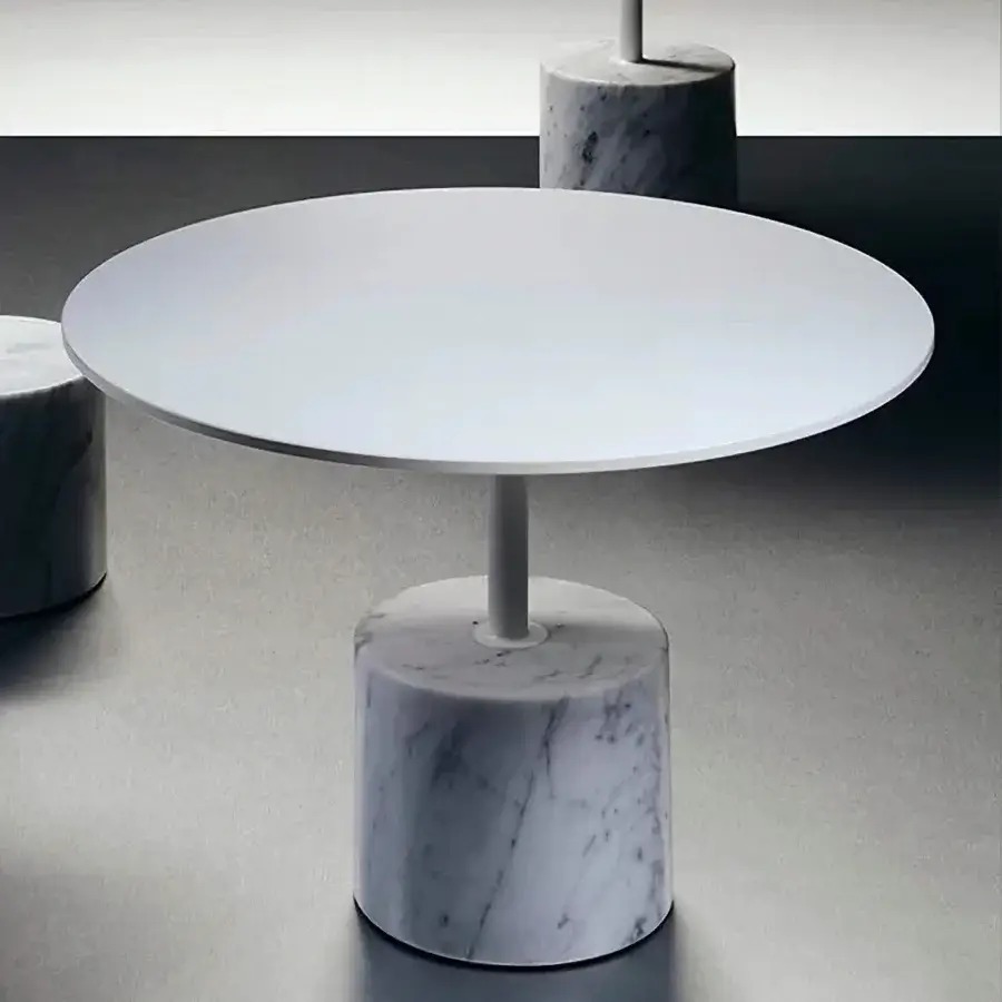 Refined Lapalma Jey coffee table with a sleek circular white tabletop and polished marble base exhibiting subtle grey veining