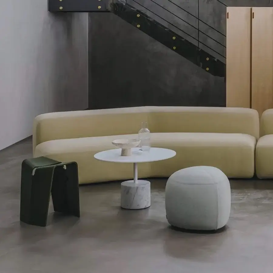 Elegant Lapalma Jey coffee table with a sleek circular white tabletop and polished marble pedestal base