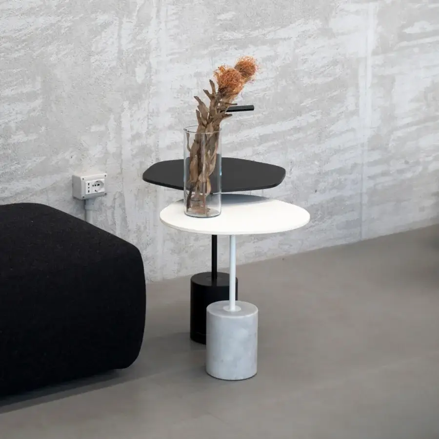 Elegant Lapalma Jey side table with tiered circular surfaces in matte black and white, supported by a satin-finish central column