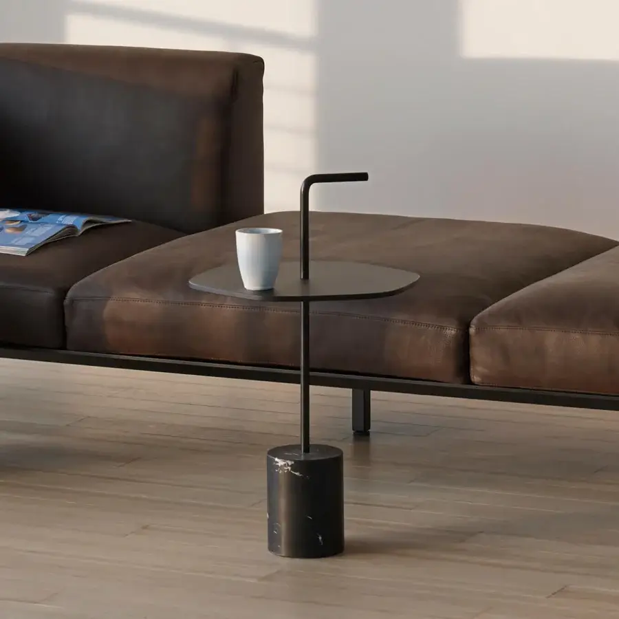 Refined Lapalma Jey side table with sleek circular black metal tabletop and subtly textured base crafted in Italy