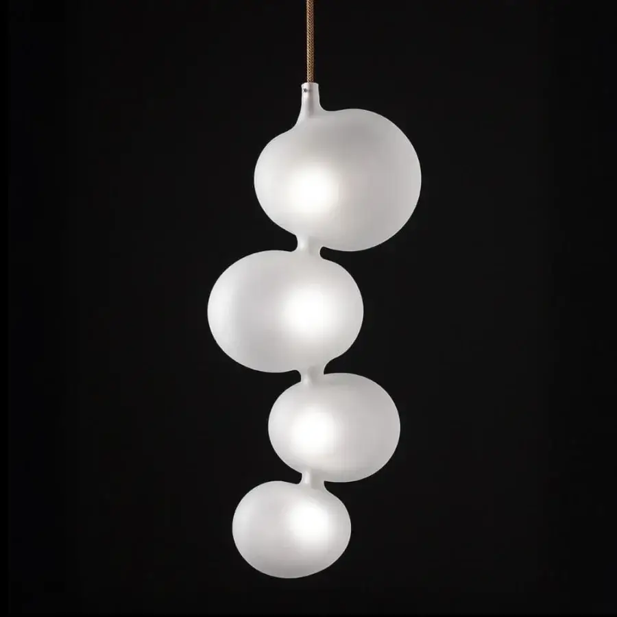 Elegant melogranoblu Serendipity suspension lamp with vertically arranged frosted glass forms and subtle illumination gradients