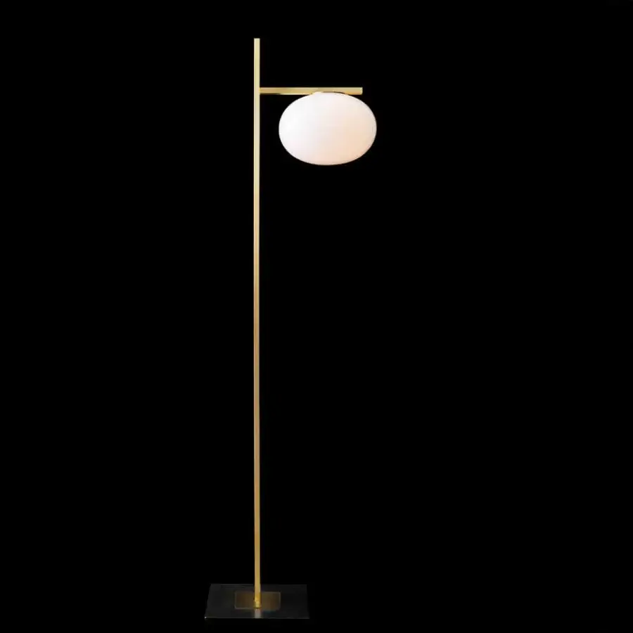 Distinguished Oluce Alba floor lamp with warm gold satin metal and contrasting anthracite base supporting frosted glass