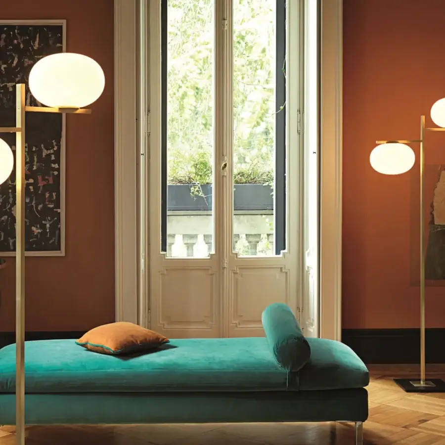 Superior Oluce Alba floor lamp in warm gold and translucent glass with a satin metal finish