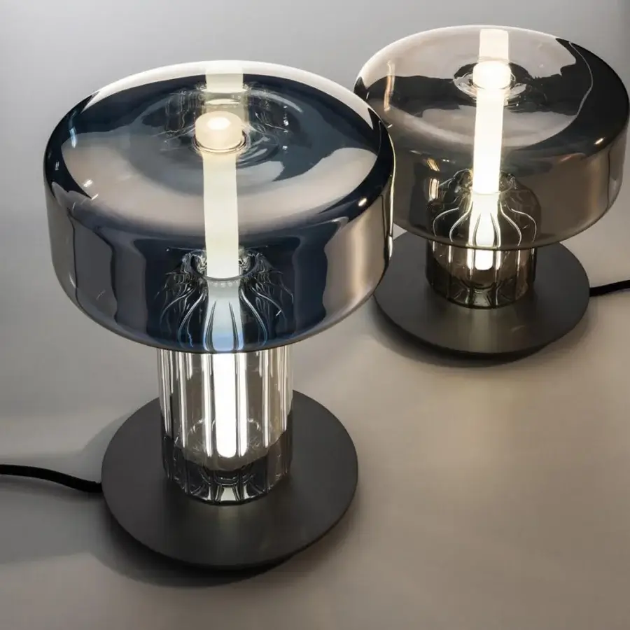 Distinguished melogranoblu Rapanui table lamp with hand-blown glass in deep blue-grey and refined gold and steel finishes