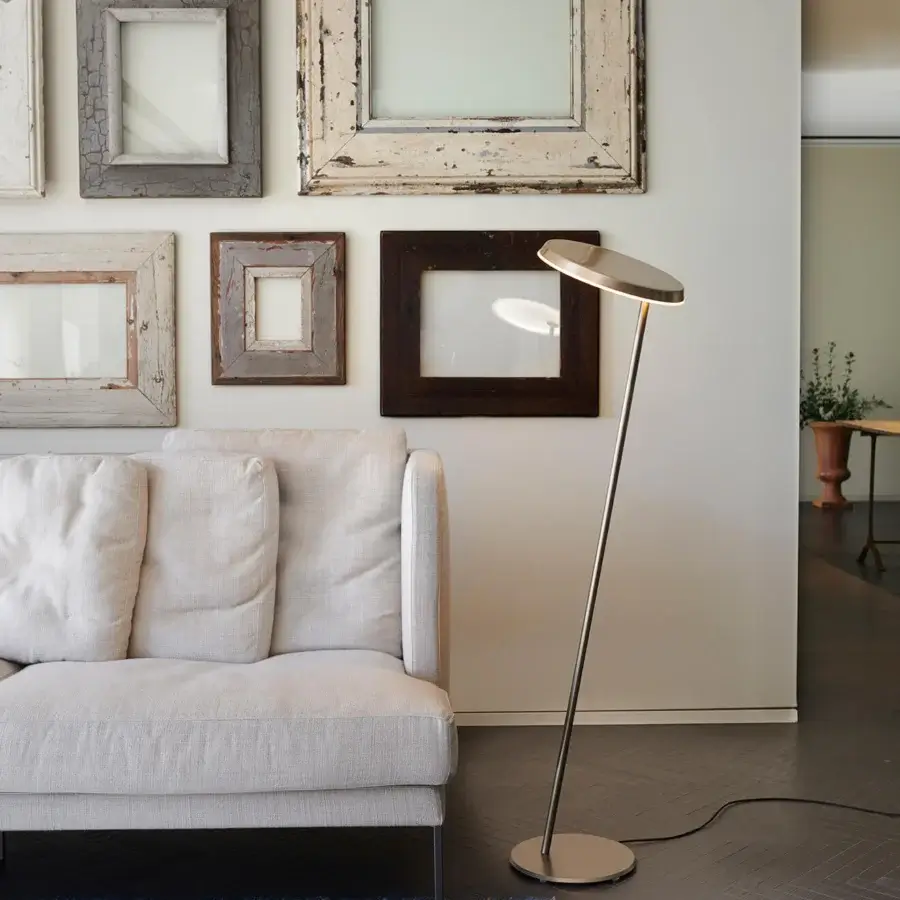 Captivating Oluce Amanita floor lamp with a slender Z-shaped form and adjustable circular head crafted in satin metal