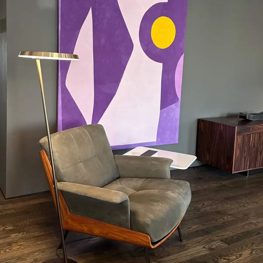 Exceptional Oluce Amanita floor lamp with a muted bronze metal stem and glossy adjustable head crafted in Italy
