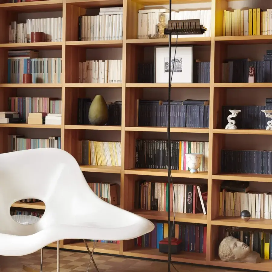Elegant Oluce Colombo floor lamp with curved metal form and polished silver-toned adjustable lampshade in satin finish