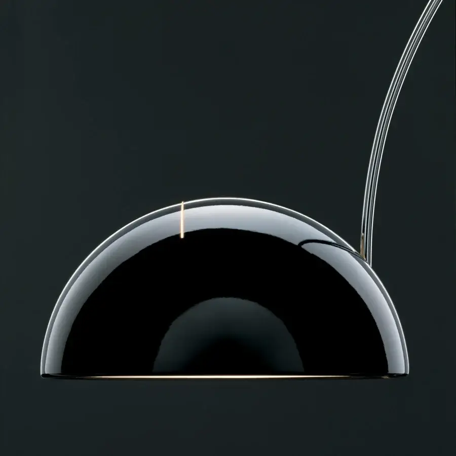 Distinguished Oluce Coupé arched floor lamp with a dramatically curved form and highly-glossy dark metal finish