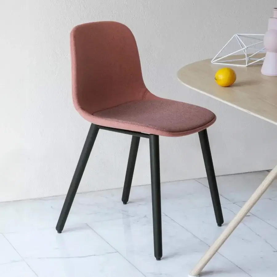 Sophisticated Lapalma Seela chair with rose textile upholstery and matte black metal legs crafted in Italy