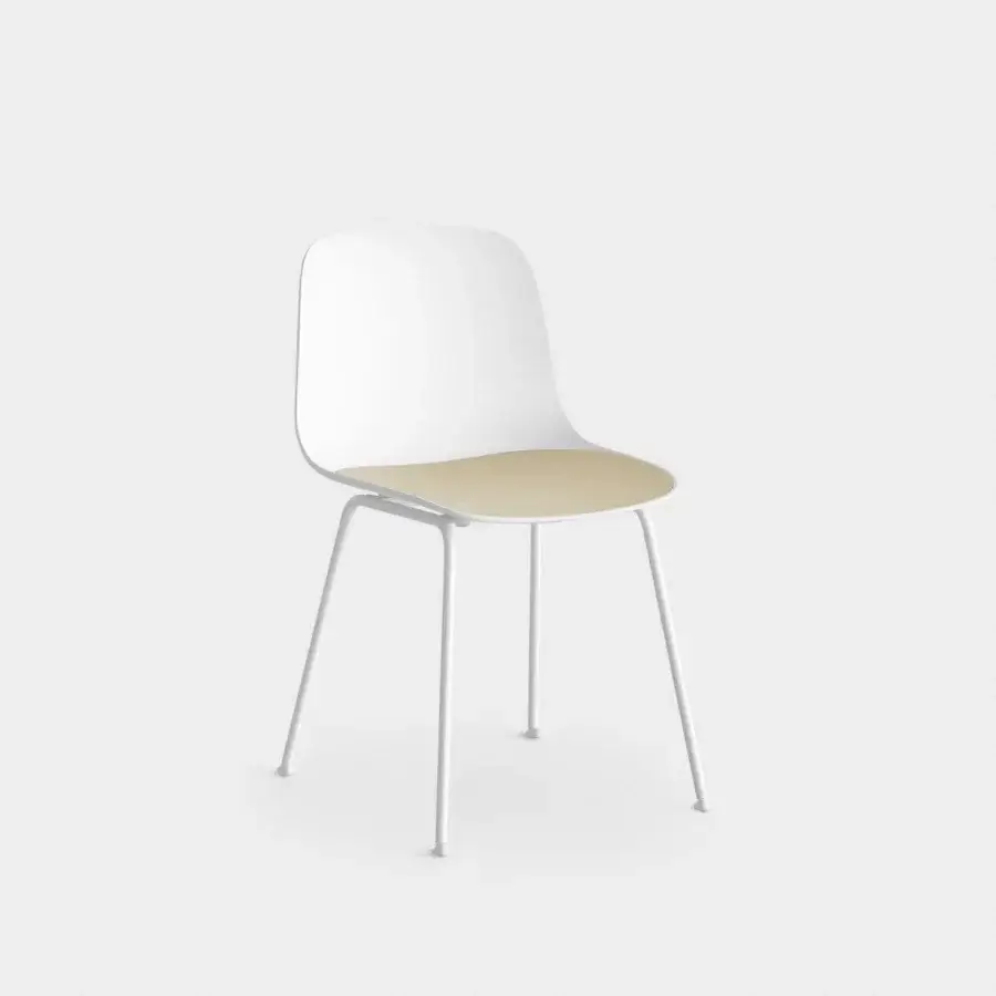 Sophisticated Lapalma Seela chair with aerodynamic design and matte white synthetic seat plus light wood grain detail and matte white metal legs