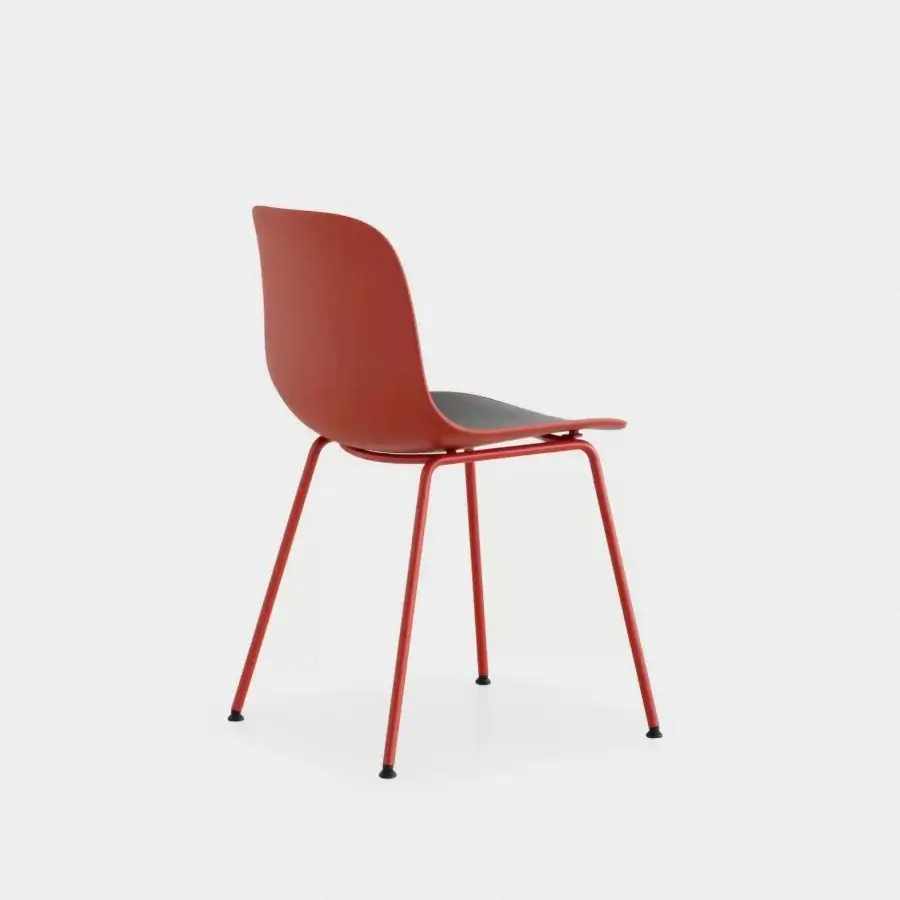 Distinctive Lapalma Seela chair with aerodynamic molded seat and backrest in reddish-orange and charcoal gray, built with matte tapered metal legs