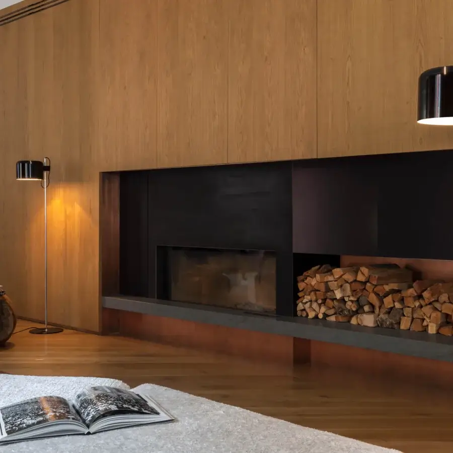 Timeless Oluce Coupé floor lamp with sleek semi-cylindrical dome and polished metal stem crafted in Italy