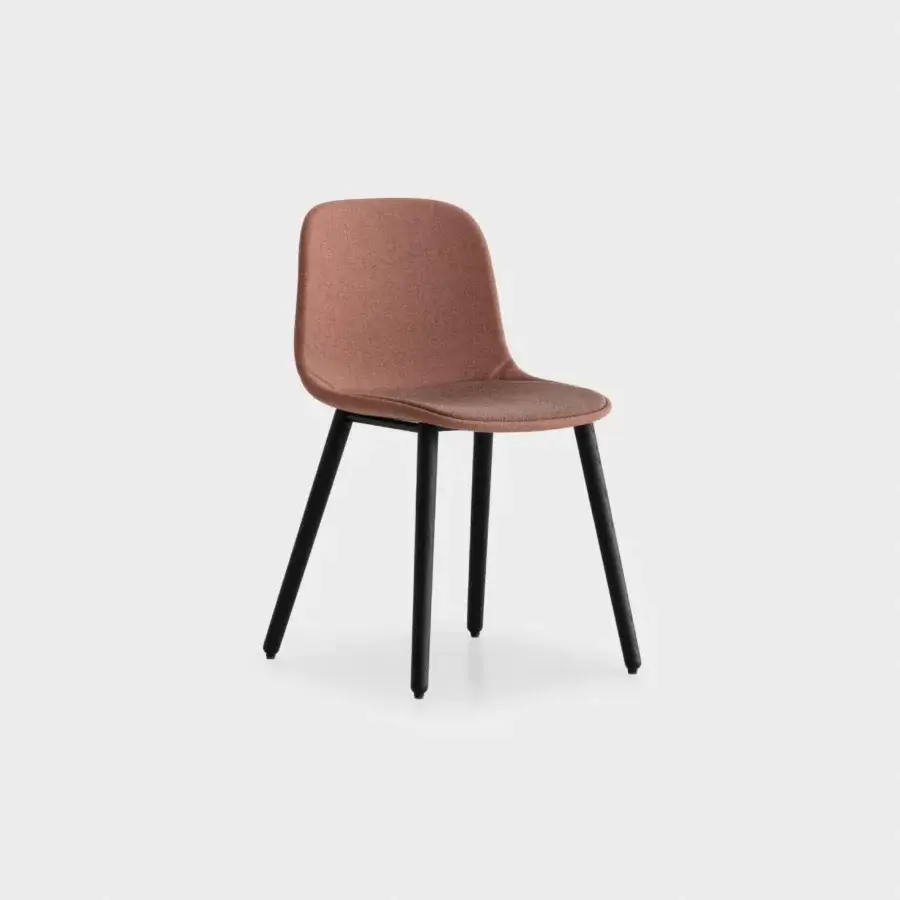 Exceptional Lapalma Seela chair with aerodynamic form upholstered in muted terracotta fabric and matte dark metal legs