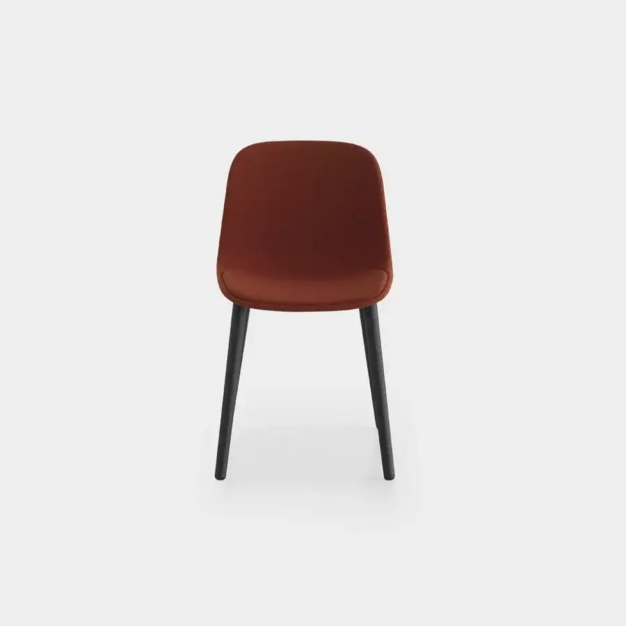 Elegant Lapalma Seela chair with aerodynamic form upholstered in reddish-brown fabric and dark-toned wood frame