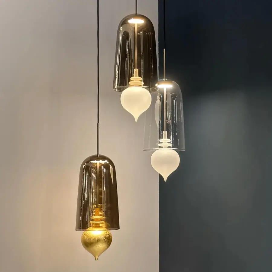 Distinctive melogranoblu Ghanta suspension lamp with hand-blown glass and warm gold leaf pendant in dark grey metal