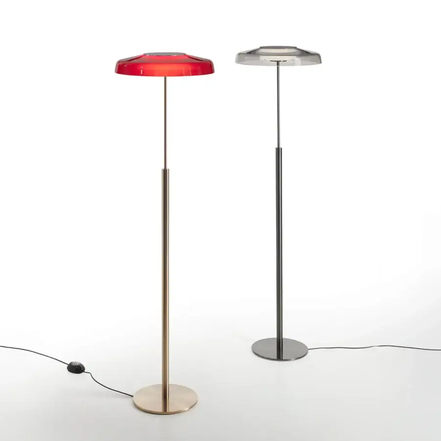 Distinguished Oluce Dora floor lamp with reddish-orange translucent glass and golden brass metal built in Italy
