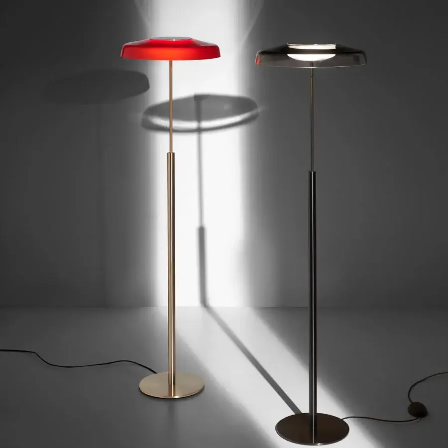 Exceptional Oluce Dora floor lamp with red glass diffuser and golden-toned metal built with glossy and satin finish