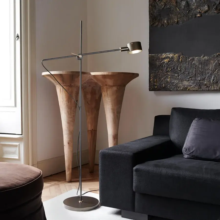 Distinguished Oluce G.O Floor Lamp with a slender silhouette and adjustable form crafted in matte dark gray metal