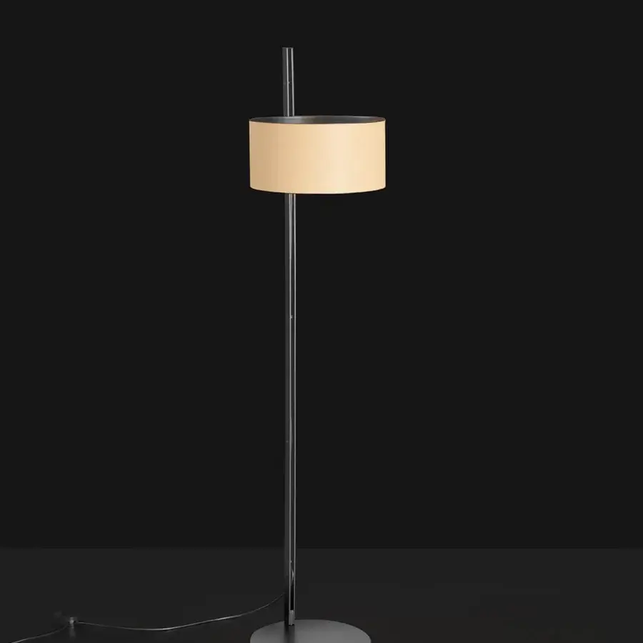 Distinctive Oluce Parallel floor lamp with a cylindrical lampshade crafted in sand tone hammered leather and matte black metallic plates
