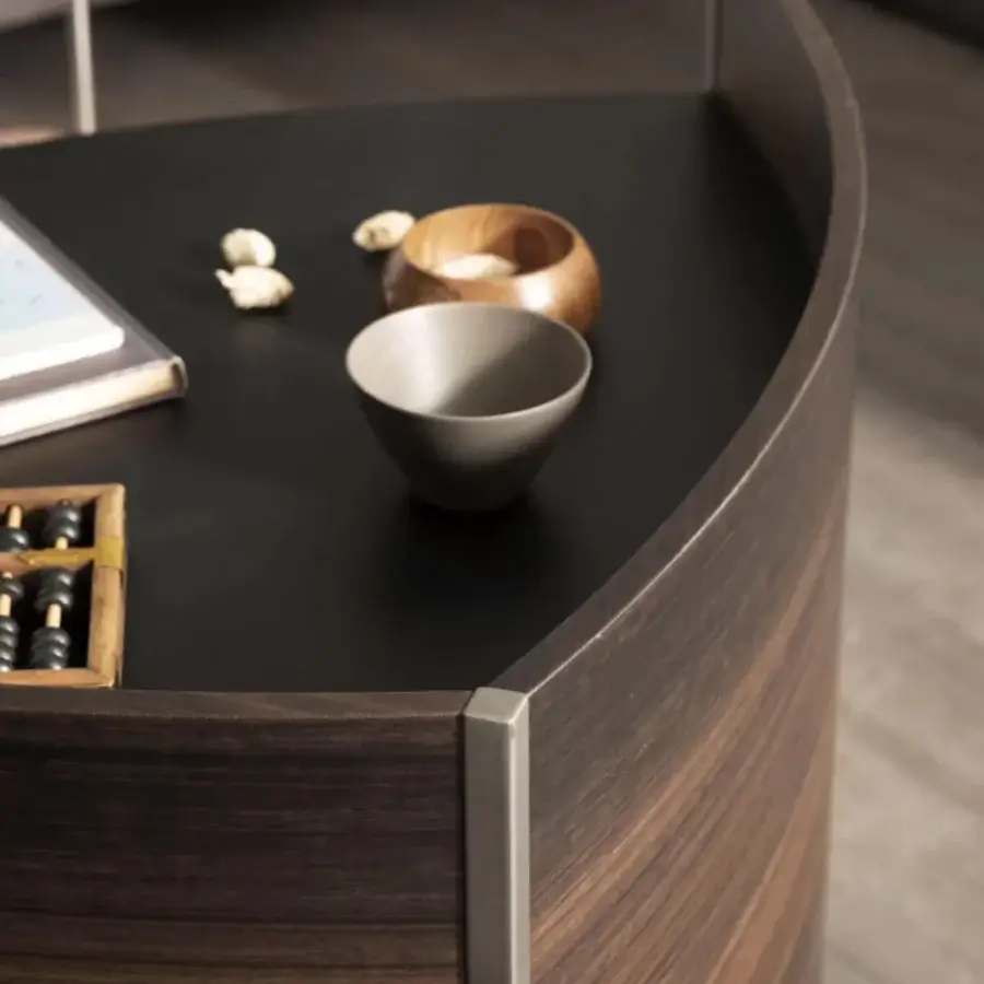 Elegant Presotto Bloom desk with curved sectional form, leather top and Metal Standard Pewter painted structure in Eucalyptus Dark finish
