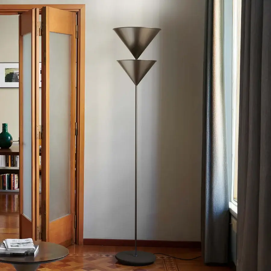 Elegant Oluce Pascal floor lamp crafted in metal with a matte dark gray finish and stacked conical shades
