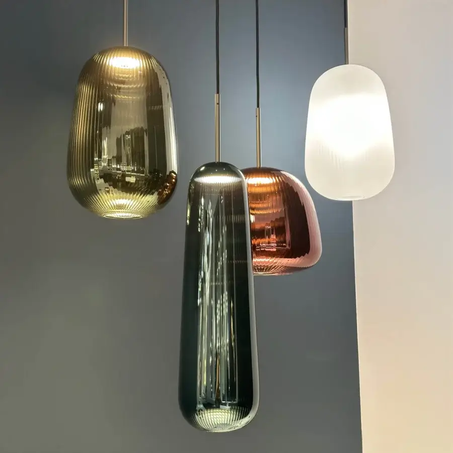 Distinguished melogranoblu Api suspension lamp crafted in sapphire pleated blown glass with glossy finish