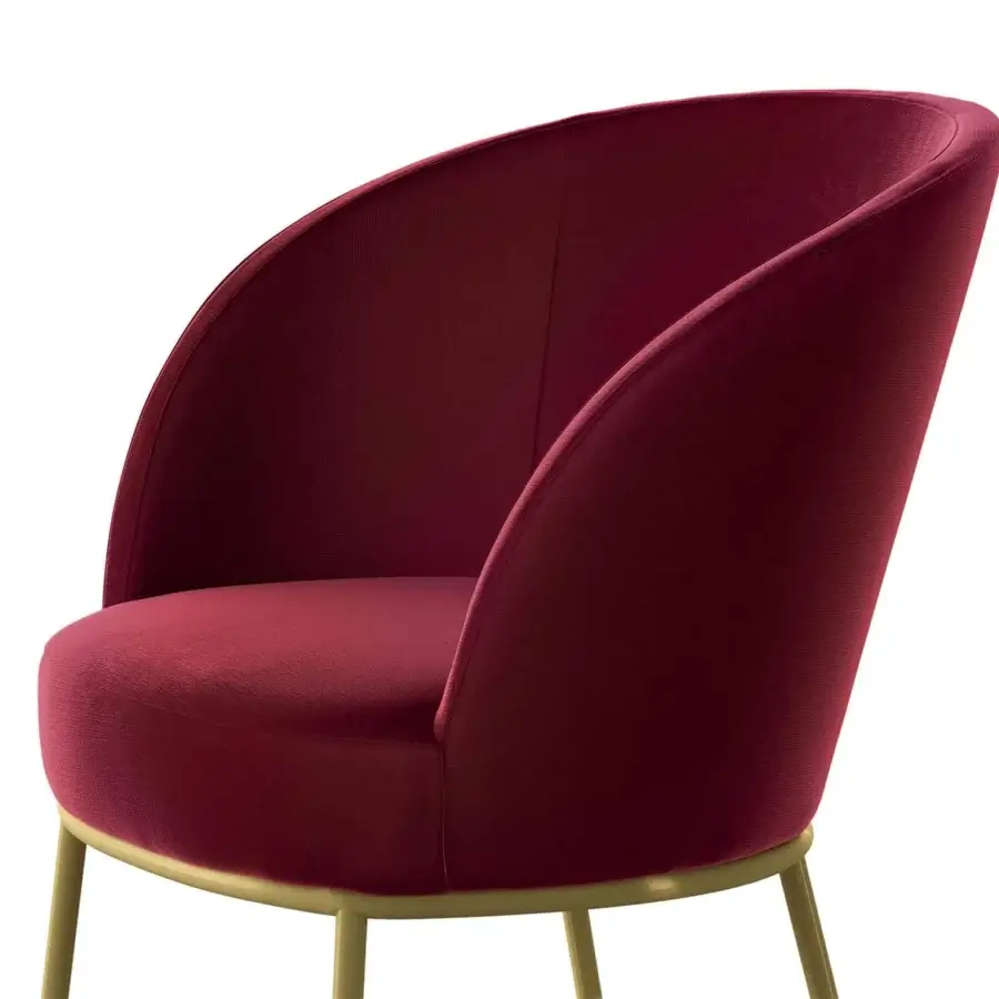 Lavish Presotto Evia armchair with soft round lines upholstered in deep red velvet and slender gold metal legs