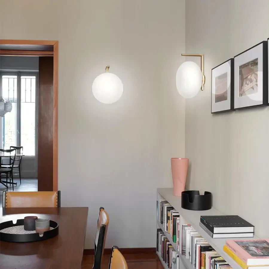 Superior Oluce Alba wall lamp crafted in frosted glass with a warm brass-toned metal finish