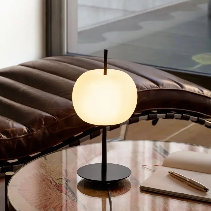 Distinguished Kundalini Kushi 10th lamp crafted in layered mouth-blown opal glass with a refined black metal structure and smooth finish