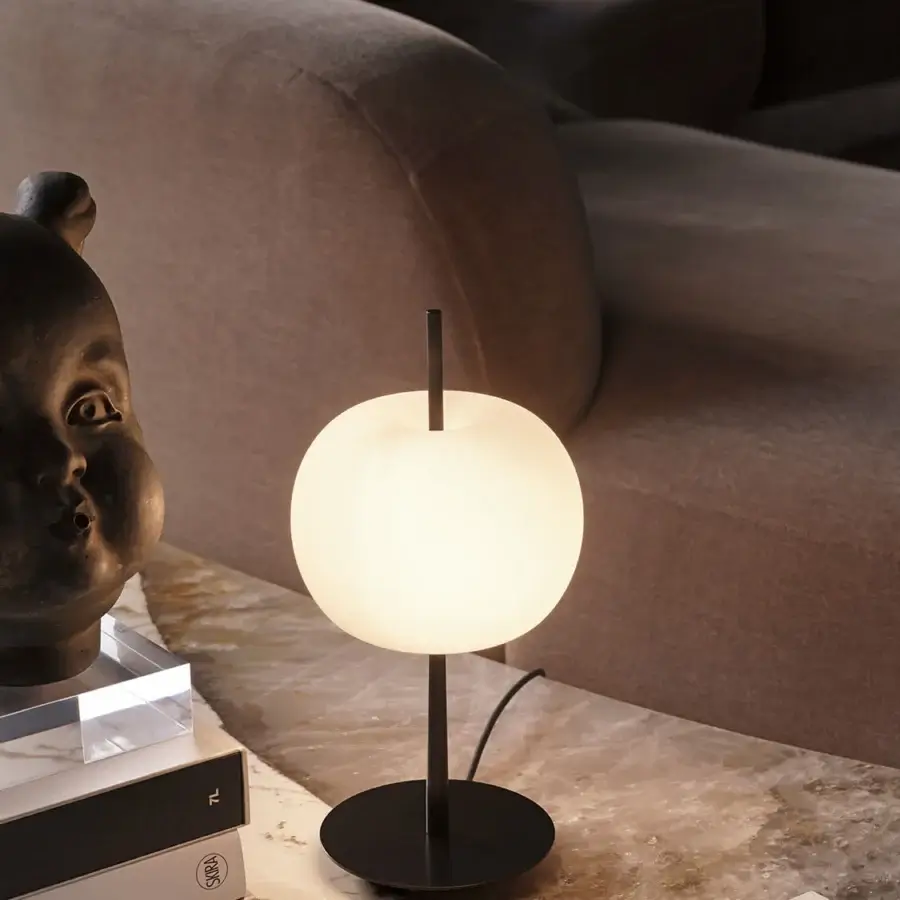 Elegant Kundalini Kushi 10th lamp crafted in layered mouth-blown opal glass with a refined black metal structure