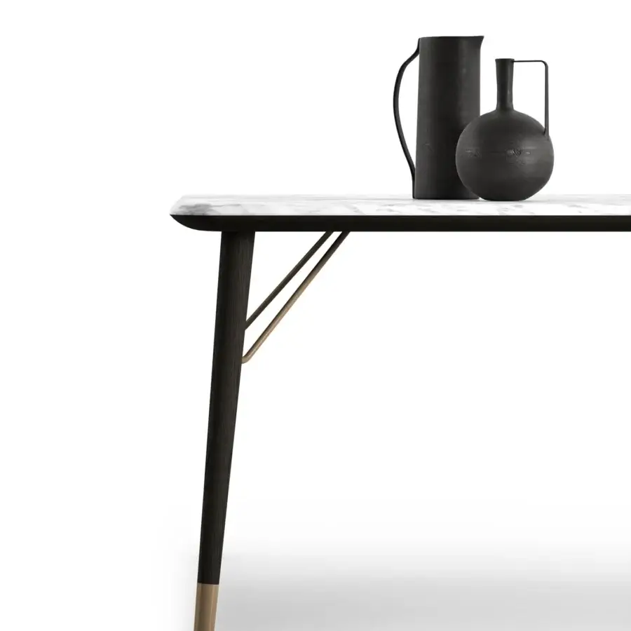 Captivating Presotto Merge table with a rectangular marble top and black ash finished wooden legs with golden metal support rods