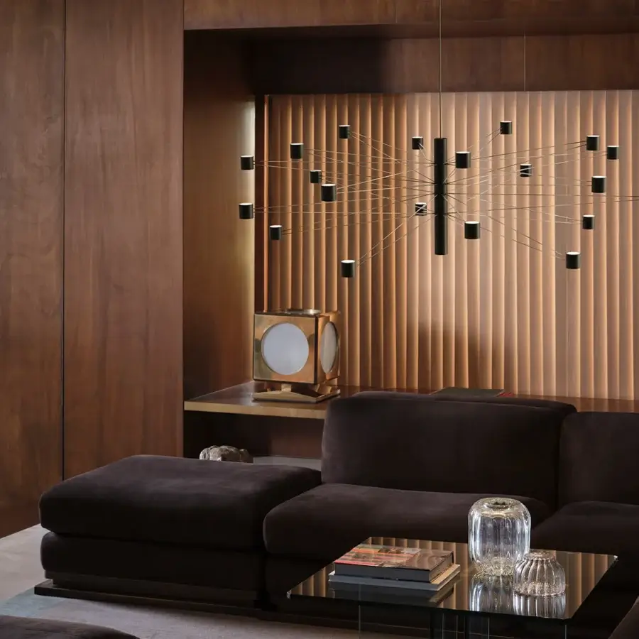 Distinguished Kundalini Polar Suspension Lamp crafted in metal with a matte black finish exhibiting interconnected rods and cubic light sources