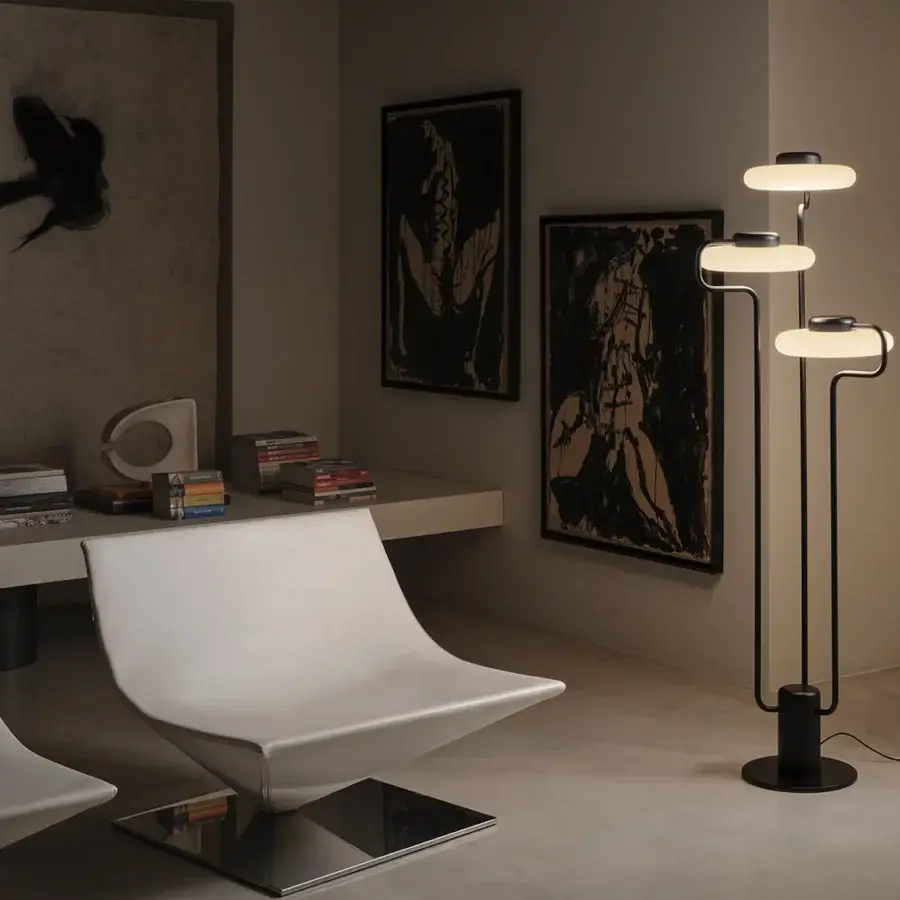 Elegant Kundalini Tratto floor lamp crafted in metal and opal glass with a matte black finish