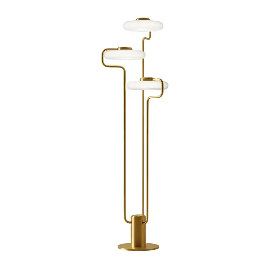 Superior Kundalini Tratto floor lamp crafted in metal and opal glass with warm gold finish and looping curves