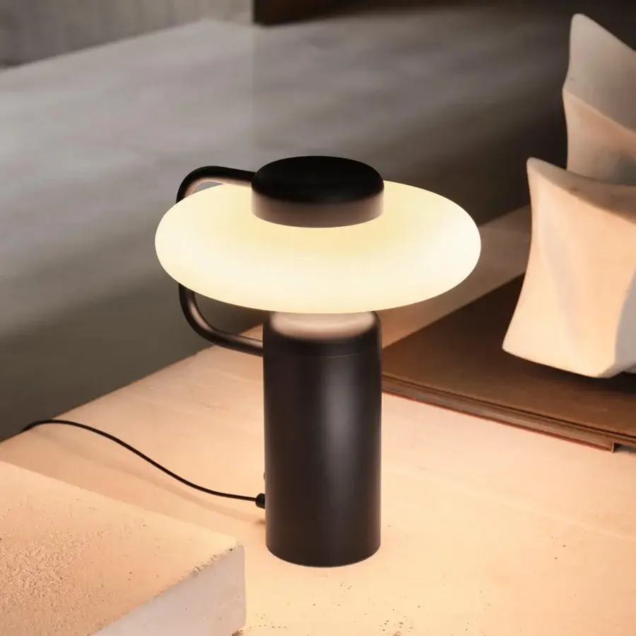 Exceptional Kundalini Tratto table lamp crafted in refined metal and opal glass with matte black finish