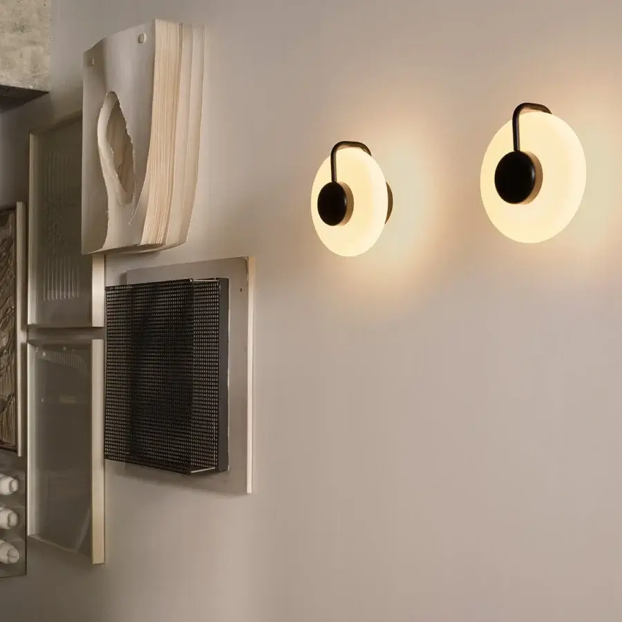 Distinguished Kundalini Tratto wall lamp crafted in sleek black metal with diffused opal glass for a modern finish
