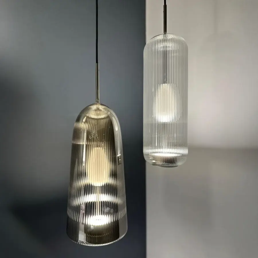 Exceptional melogranoblu Piero suspension lamp crafted in translucent ribbed handblown glass with a glossy finish