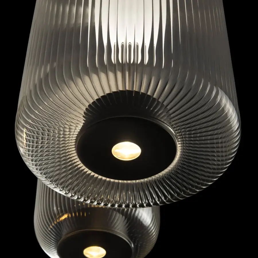 Elegant melogranoblu Piero suspension lamp crafted in dark gray metallic housing with glossy ribbed handblown glass
