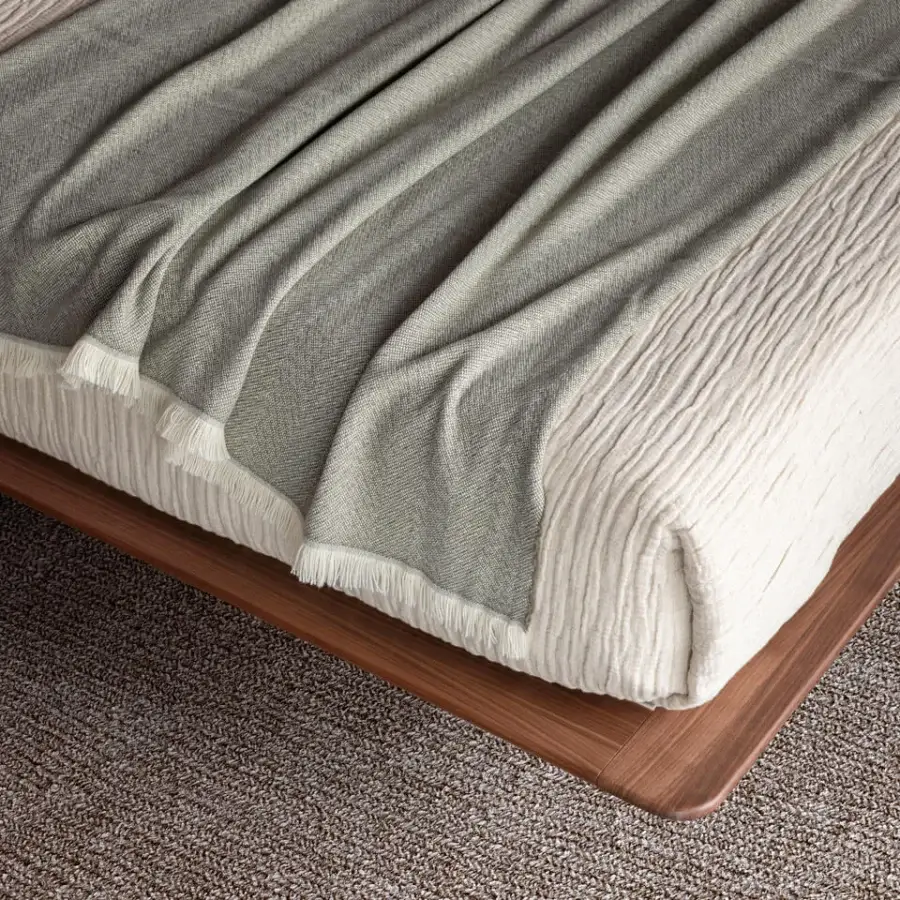 Elegant Presotto Dress Code bed with wood veneer and metal feet, showcasing a satin finish and removable textile headboard