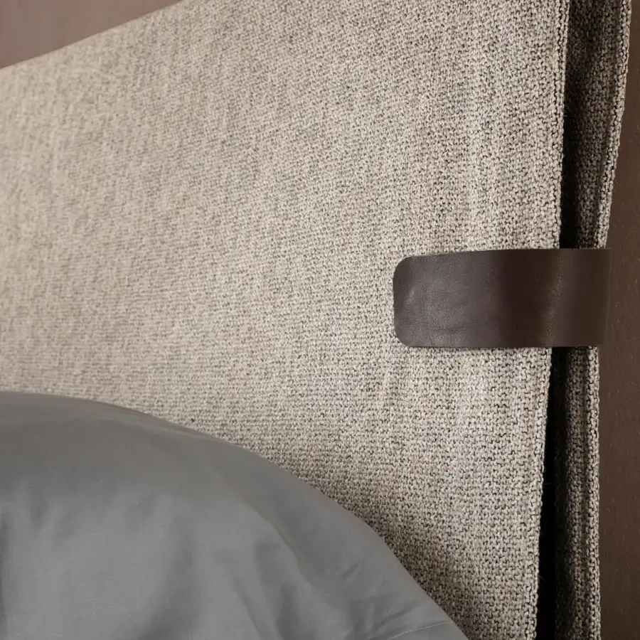 Superior Presotto Dress Code bed with dark brown wood veneer, textured beige textile, and leather strap detail crafted in Italy