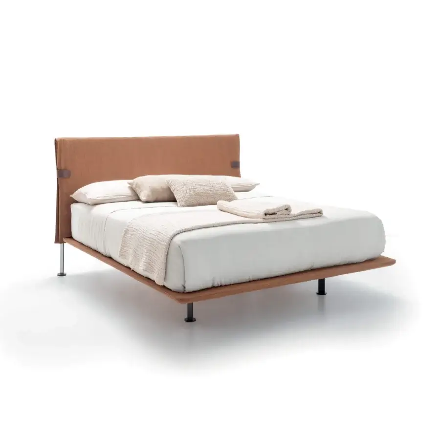 Distinguished Presotto Dress Code bed with earthy brown textile upholstery and dark metal feet crafted in Italy with a matte finish