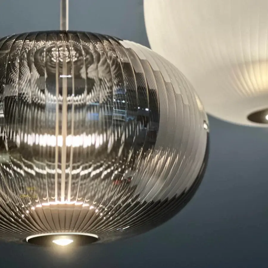 Exceptional melogranoblu Suleyman suspension lamp crafted with ruled glass in a shimmering silvery-grey tone and dual illumination