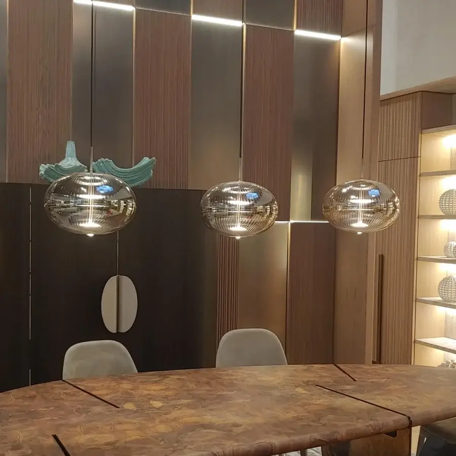 Superior melogranoblu Suleyman suspension lamp crafted with handblown ribbed glass in a warm amber tone